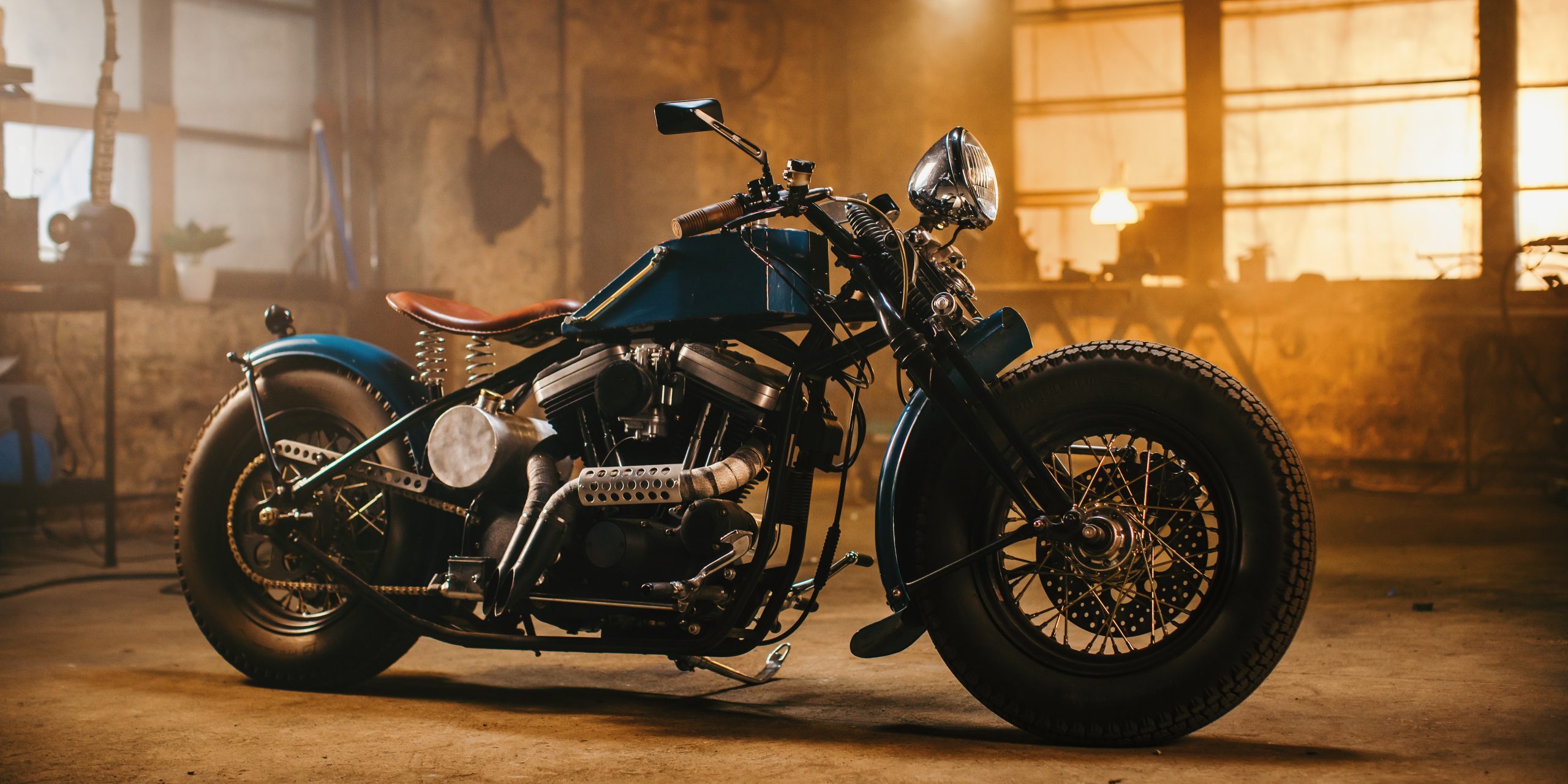Custom Bobber Motorbike Standing In An Authentic Creative Worksh Custom Bobber Motorbike Standing In An Authentic Creative Worksh